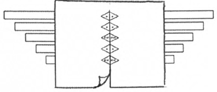 The base seen from above with eight strips threaded through the slit and their pointed flaps peeking up along the center