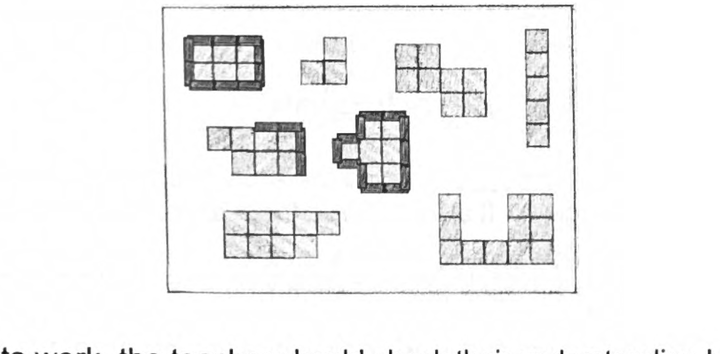 Pasted grid shapes with single inch strips glued end to end around their edges to mark the perimeter