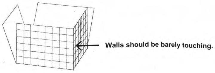 A folded paper box with an arrow pointing to a corner edge where two walls meet, labeled walls should be barely touching